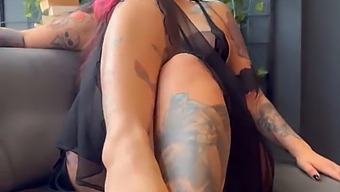 Aroused Young Woman With Tattoos Displaying Her Physique
